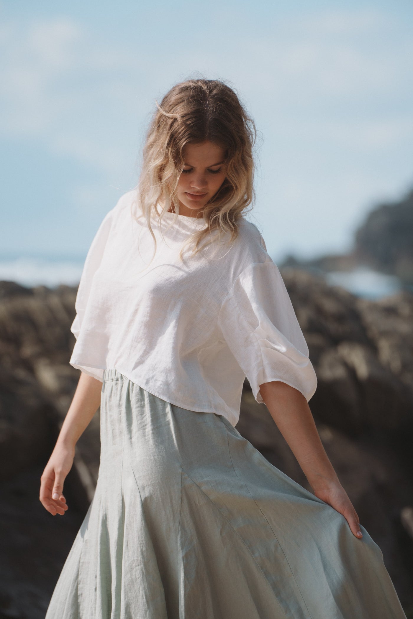 LILLY PILLY Collection model wearing Stella linen skirt in Tea paired with Tina linen top in Ivory
