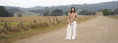 LILLY PILLY COollection model wearing Oli organic linen pants in Oatmeal