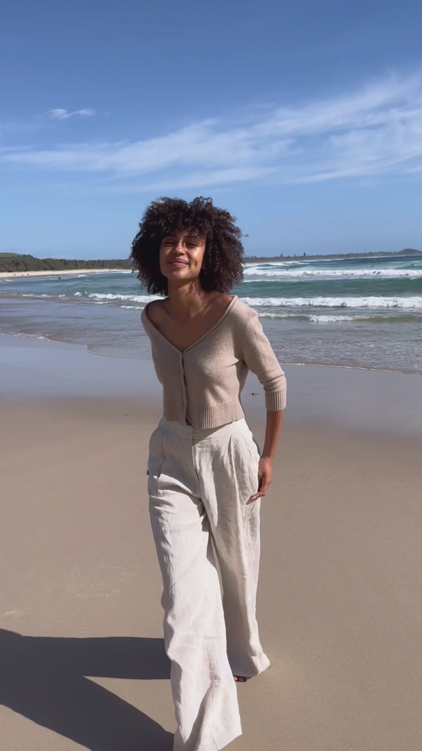 Video of Lilly Pilly Collection recycled Cashmere cardigan top in Oatmeal paired with Olivia organic linen pants in Ivory