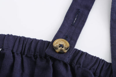 Lilly Pilly Collection 100% organic linen Luna Dress in Denim Blue showing close up of button